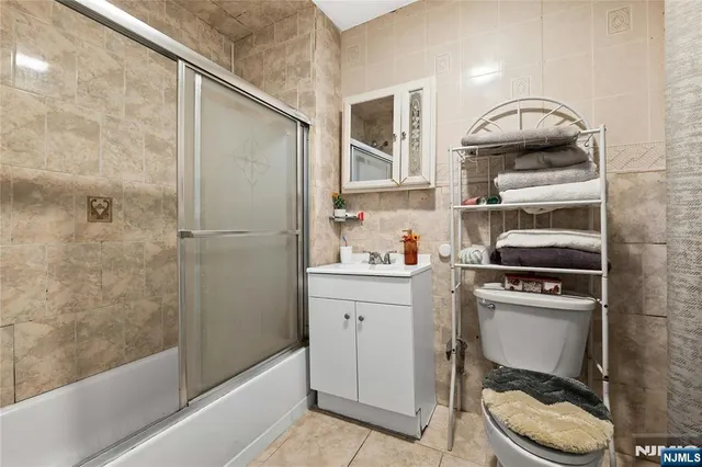 a kitchen with a cabinets and appliances