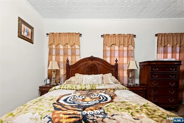 a kitchen with stainless steel appliances a refrigerator sink and cabinets