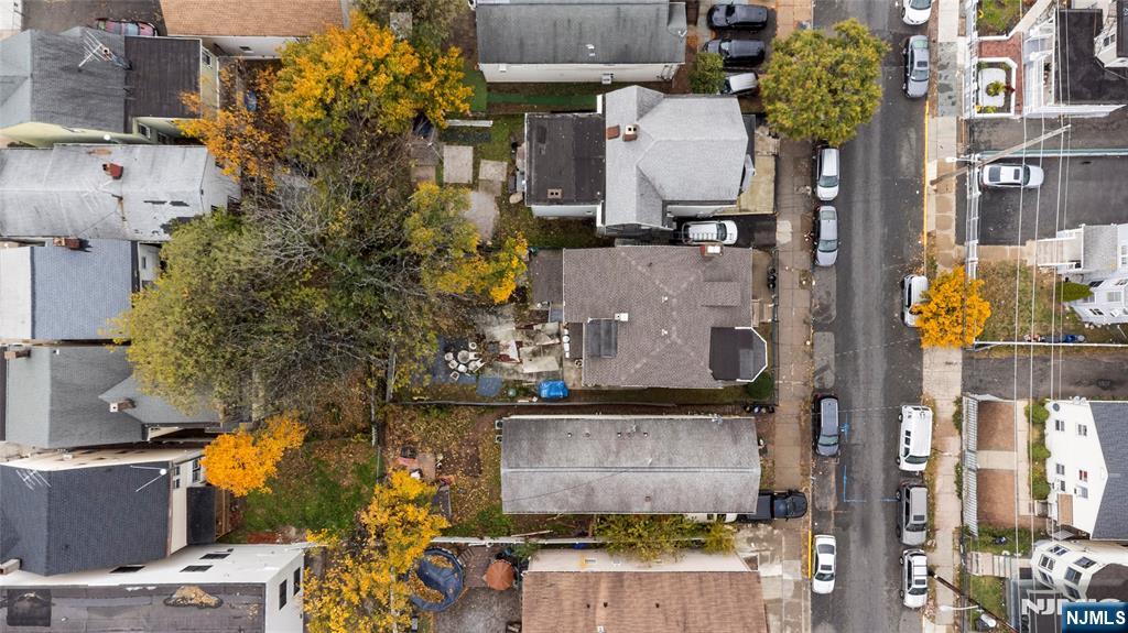 436 Ellison Street Paterson, NJ 07501 - Photo 3 of 47 an aerial view of residential houses with outdoor space