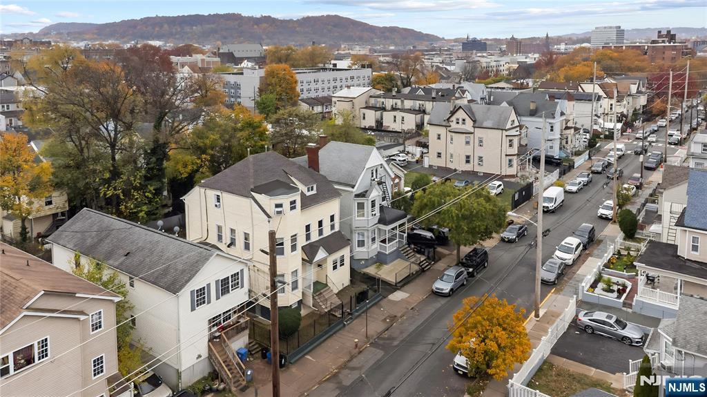 436 Ellison Street Paterson, NJ 07501 - Photo 4 of 47 an aerial view of residential house with outdoor space