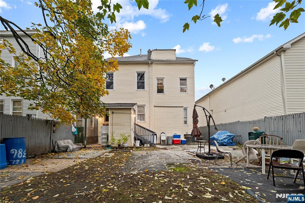 436 Ellison Street Paterson, NJ 07501 - Photo 44 of 47 a view of a house with a patio