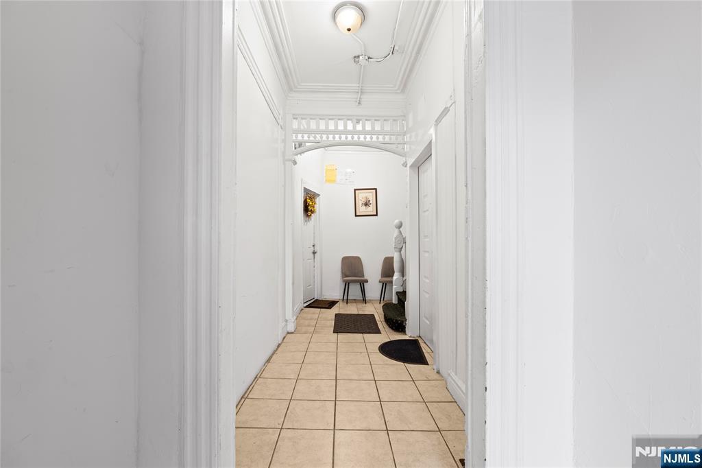 436 Ellison Street Paterson, NJ 07501 - Photo 7 of 47 a bathroom with a sink and a mirror