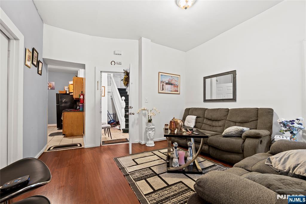 436 Ellison Street Paterson, NJ 07501 - Photo 8 of 47 a living room with furniture