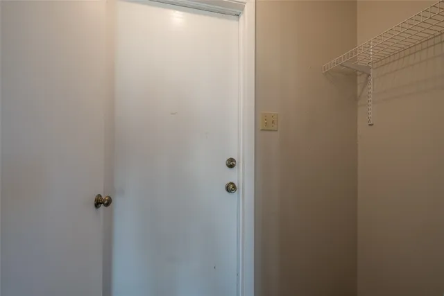 a view of house with backyard and green space