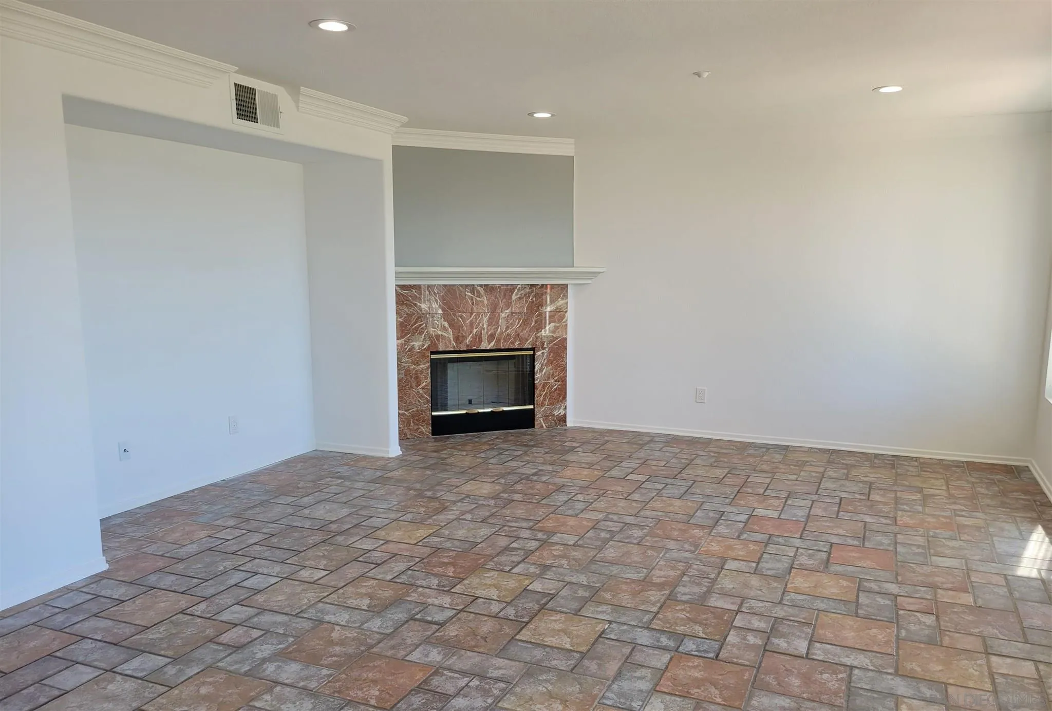 2154 Crystal Clear Drive Spring Valley, CA 91978 - Photo 3 of 5 a view of empty room with a fireplace