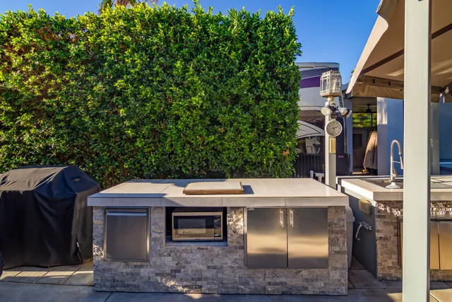 a view of swimming pool with a patio
