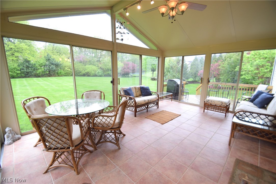 4461 Ridge Crest Drive Akron, OH 44321 - Photo 26 of 32 3 Season Sunroom enters to Deck