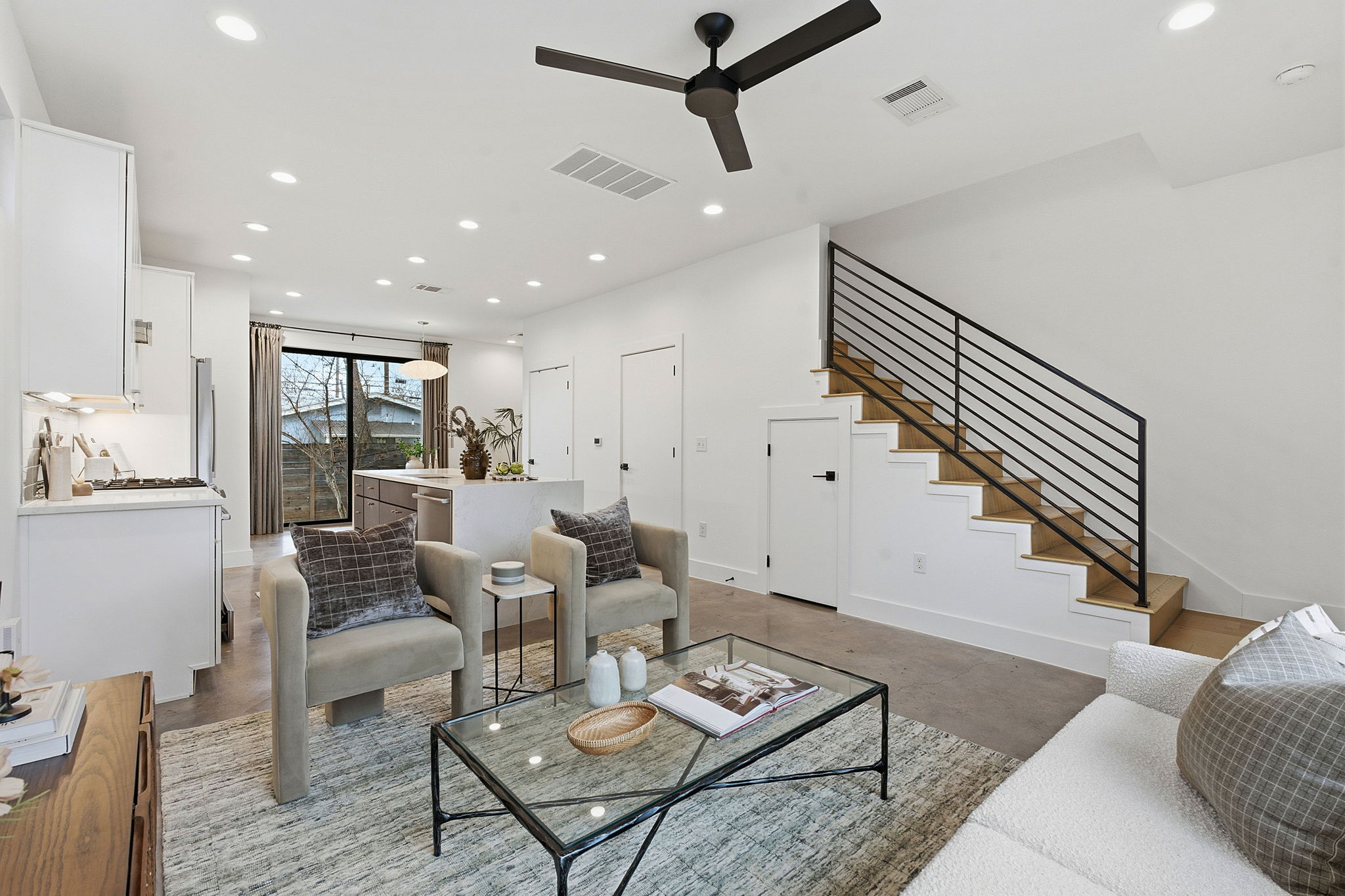 2411 Santa Rosa Street, Unit A Austin, TX 78702 - Photo 2 of 24 Living room with recessed lighting, finished concrete flooring, and a ceiling fan