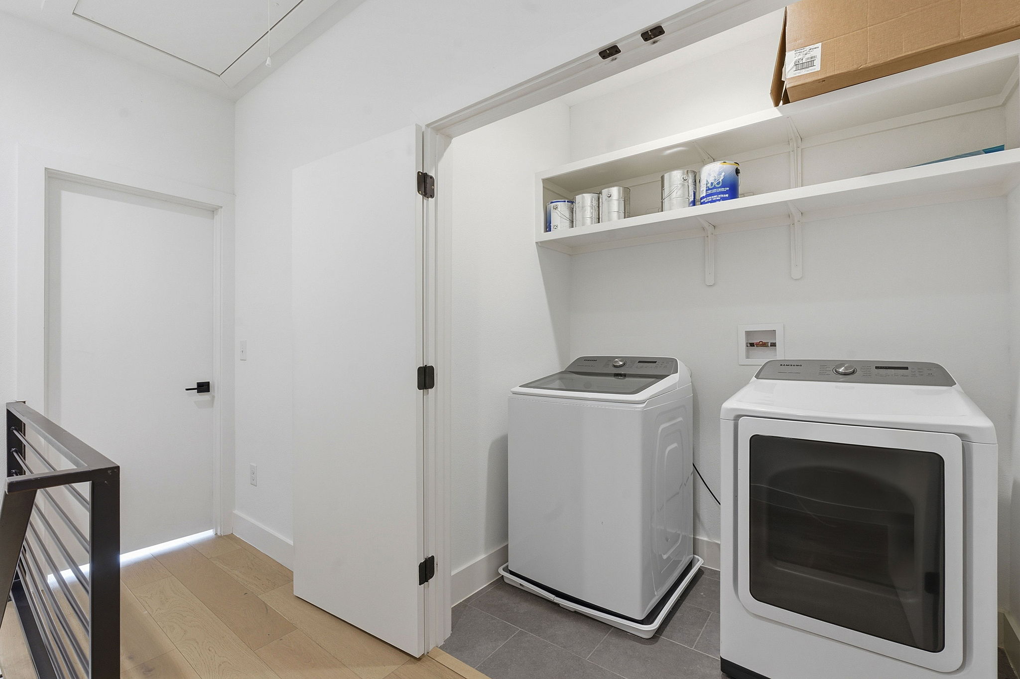 2411 Santa Rosa Street, Unit A Austin, TX 78702 - Photo 22 of 24 Laundry area with washing machine and clothes dryer and attic access