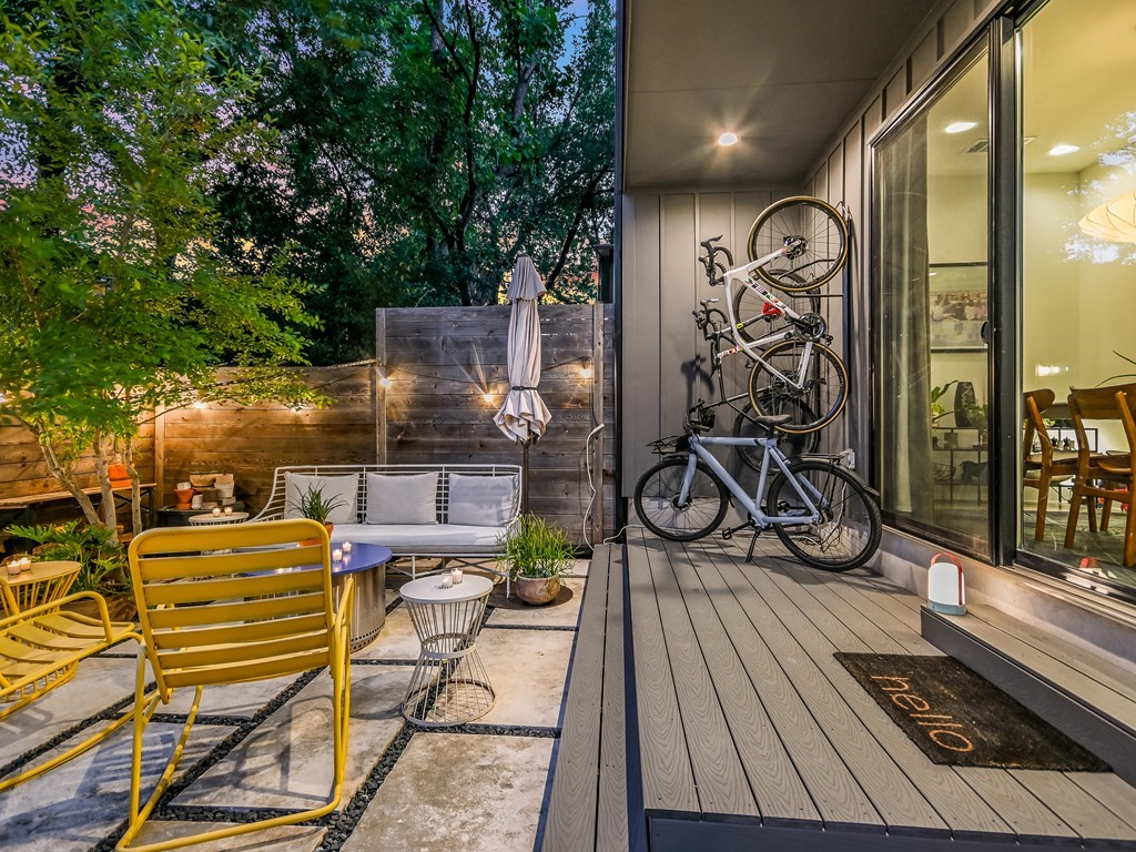2411 Santa Rosa Street, Unit A Austin, TX 78702 - Photo 10 of 24 Wooden terrace featuring an outdoor living space and a patio