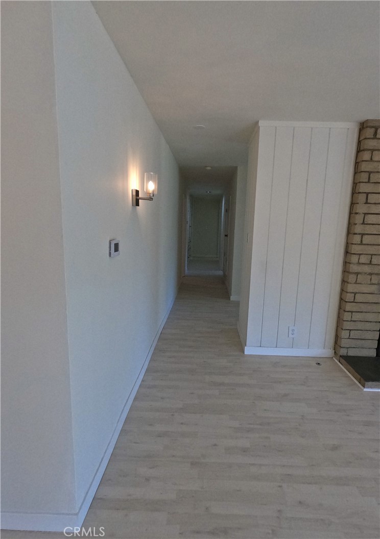 1515 Belleau Road Glendale, CA 91206 - Photo 11 of 35 a view of an empty room with wooden floor and a window