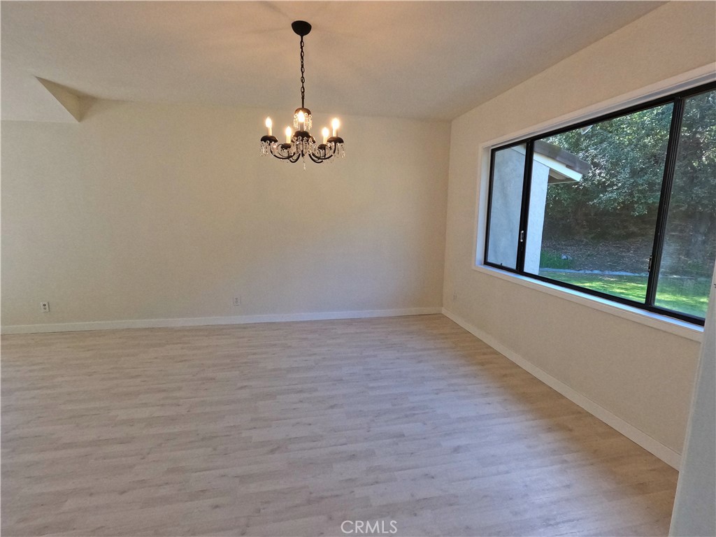 1515 Belleau Road Glendale, CA 91206 - Photo 12 of 35 a view of a livingroom with a ceiling fan window and a view of kitchen