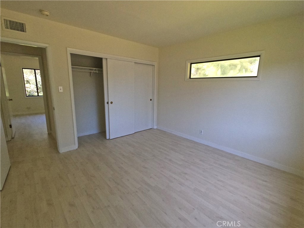1515 Belleau Road Glendale, CA 91206 - Photo 21 of 35 a view of a big room with wooden floor and windows