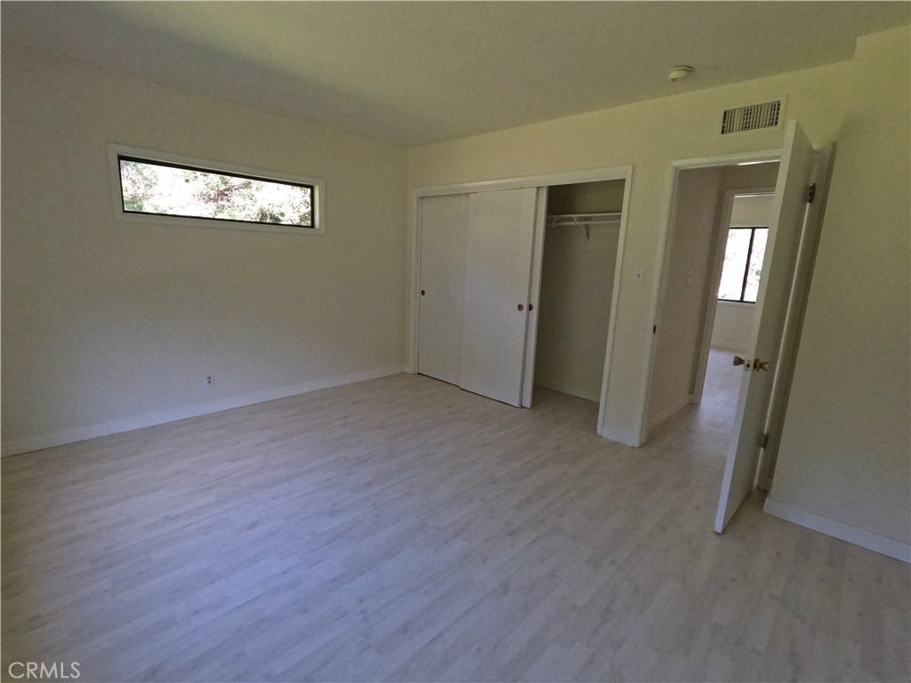 1515 Belleau Road Glendale, CA 91206 - Photo 23 of 35 a view of a room with wooden floor and a window