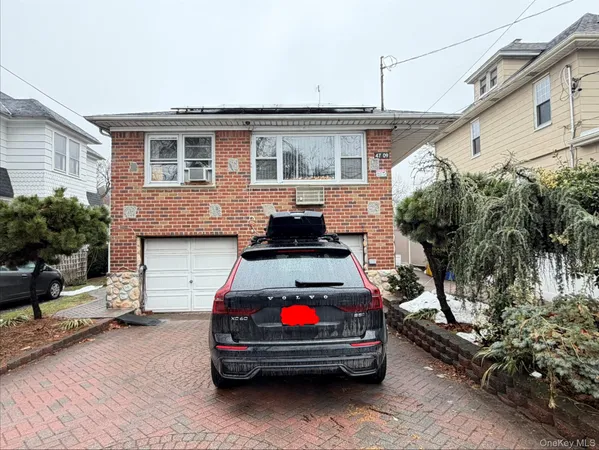 a car parked in front of a house