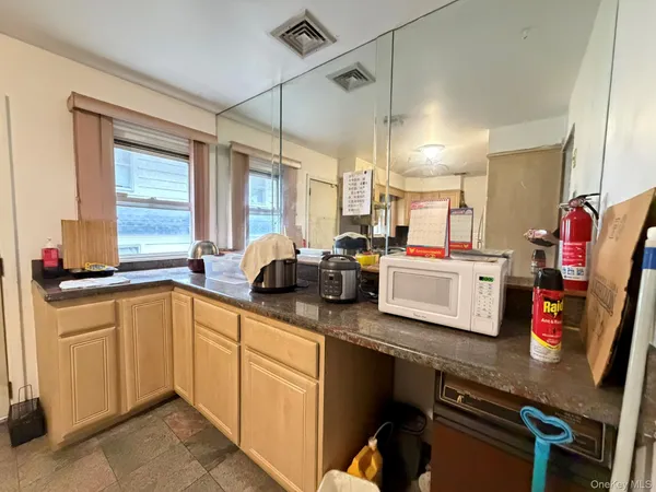 a kitchen with counter top space cabinets and a sink