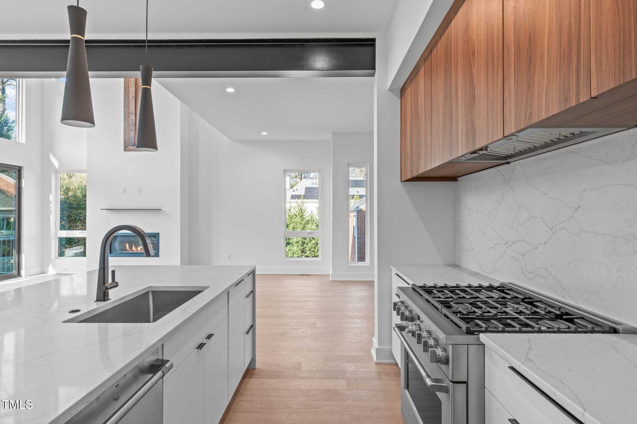 1439 Duplin Road Raleigh, NC 27607 - Photo 11 of 78 a kitchen with kitchen island granite countertop a sink stainless steel appliances and cabinets