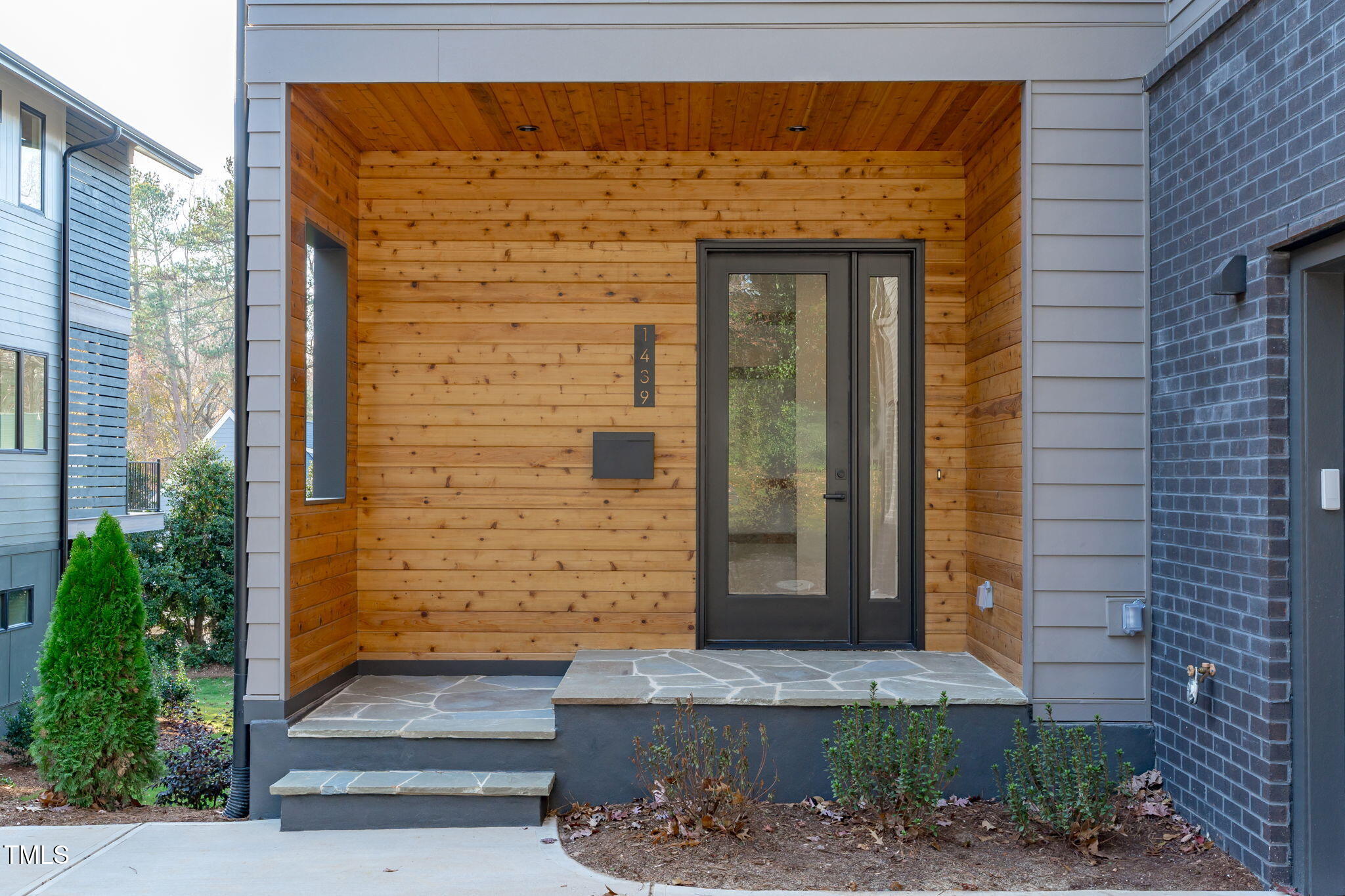 1439 Duplin Road Raleigh, NC 27607 - Photo 2 of 78 a front view of a house with a yard