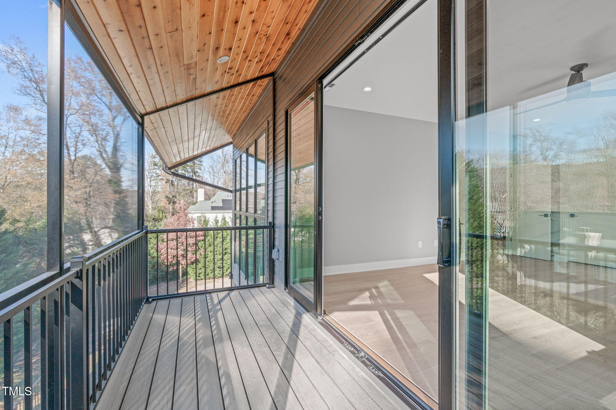 1439 Duplin Road Raleigh, NC 27607 - Photo 35 of 78 a view of balcony with a glass door