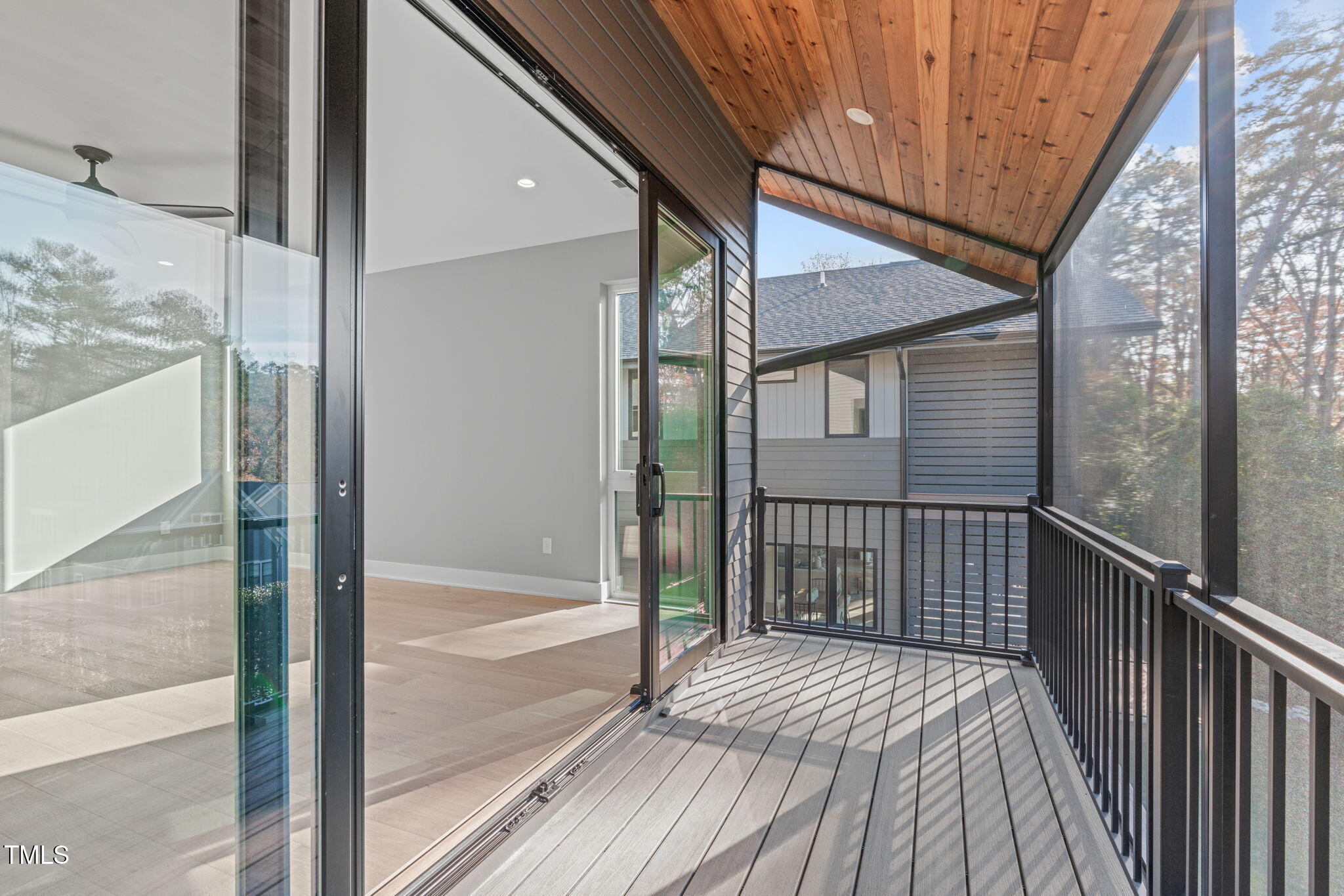 1439 Duplin Road Raleigh, NC 27607 - Photo 36 of 78 a view of a balcony with wooden floor