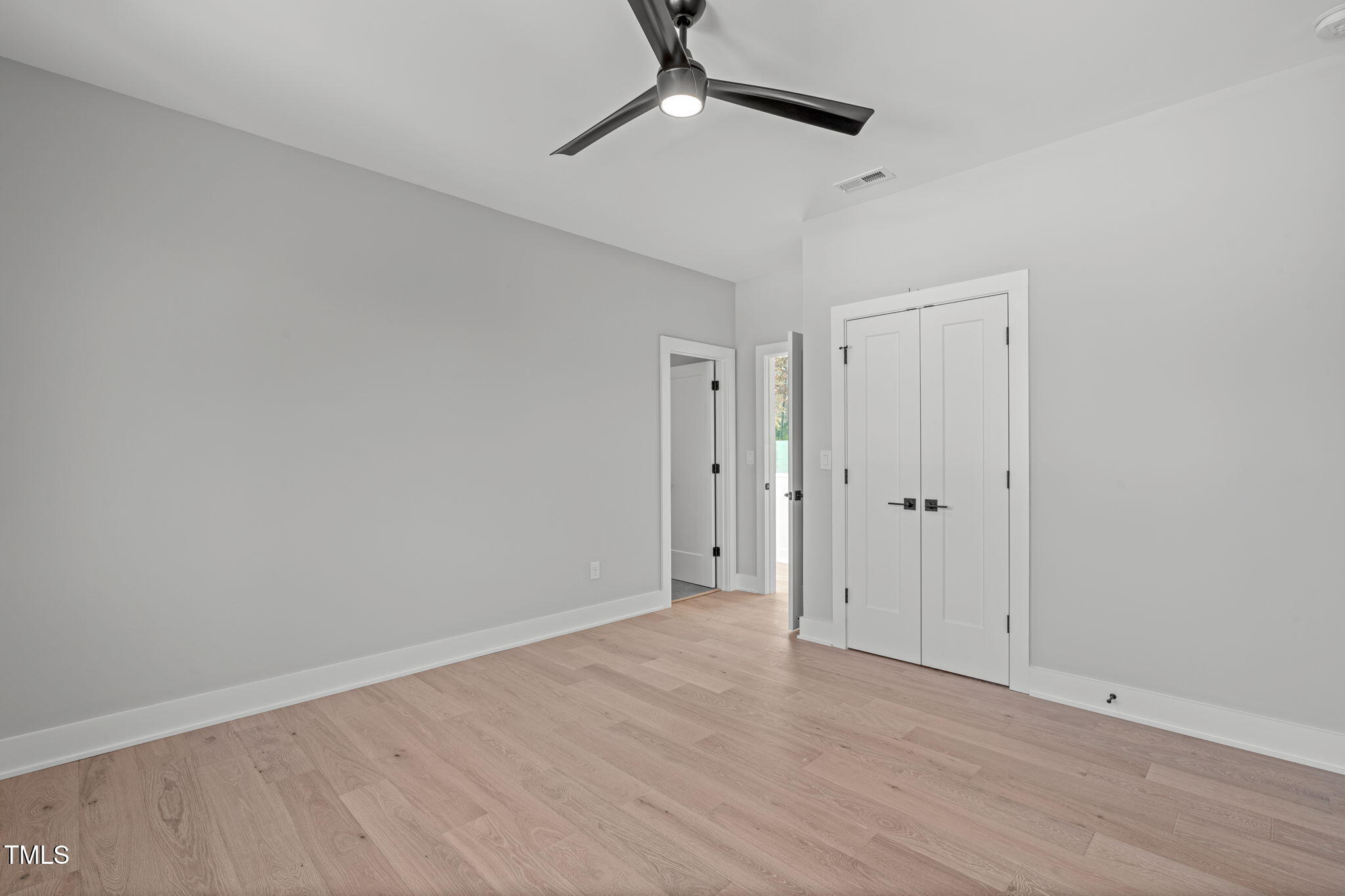 1439 Duplin Road Raleigh, NC 27607 - Photo 41 of 78 a view of an empty room with a window