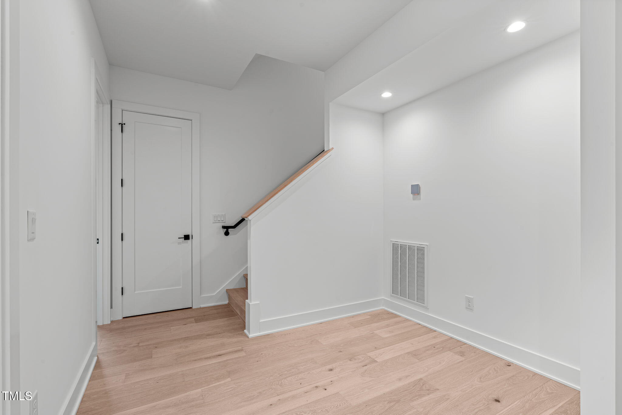 1439 Duplin Road Raleigh, NC 27607 - Photo 48 of 78 wooden floor in an empty room with a window