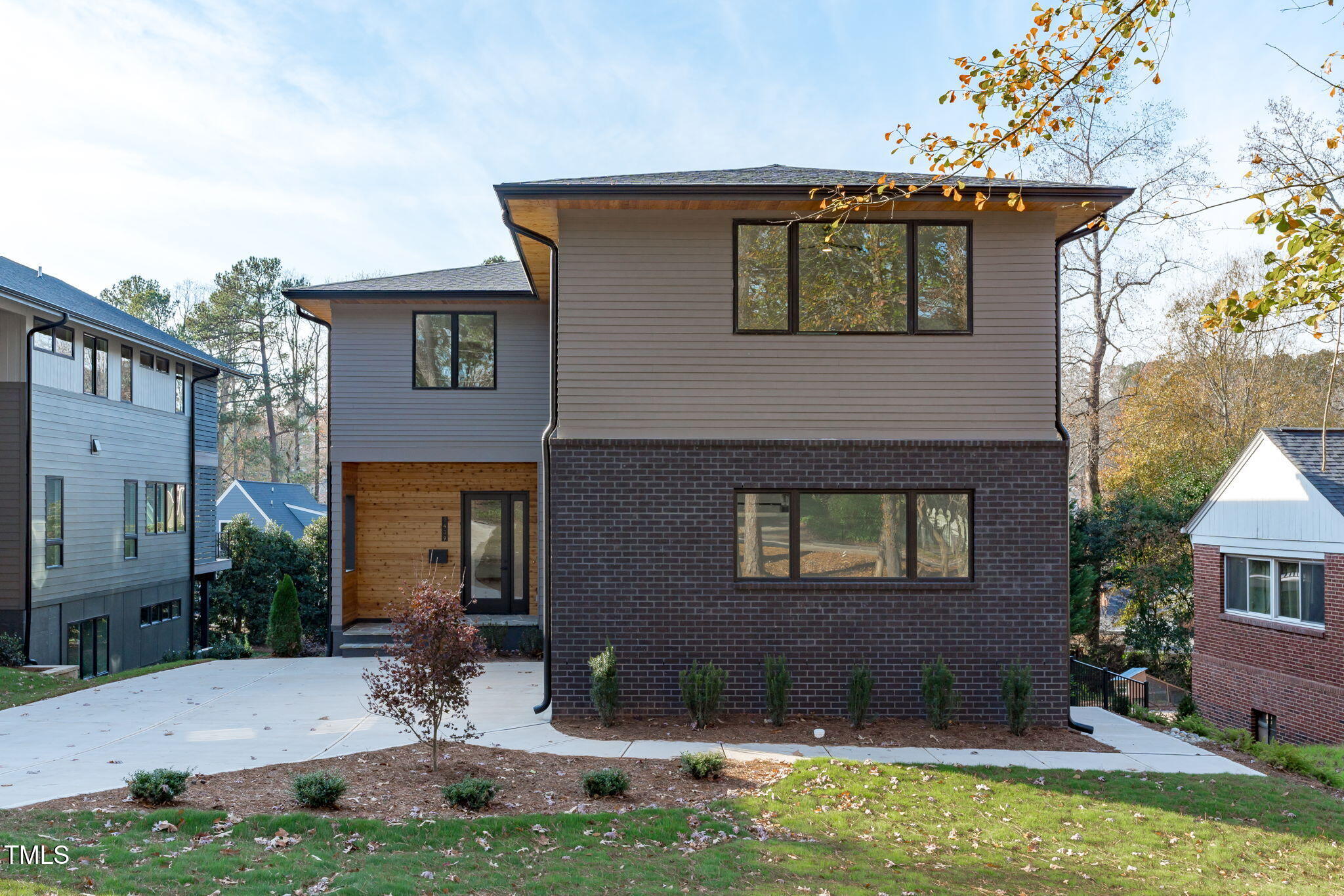 1439 Duplin Road Raleigh, NC 27607 - Photo 64 of 78 a front view of a house with garden
