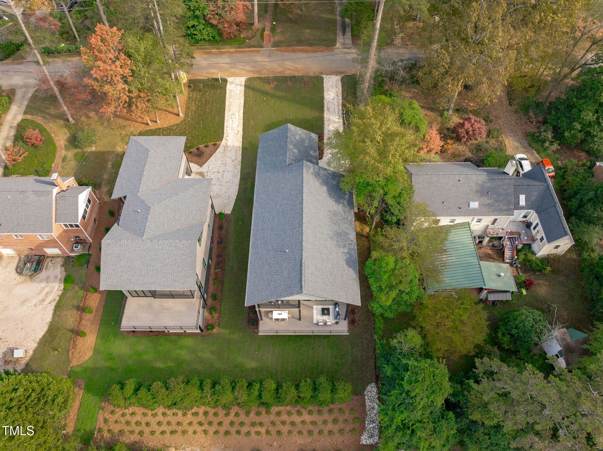 1439 Duplin Road Raleigh, NC 27607 - Photo 66 of 78 an aerial view of a house with outdoor space and a lake view