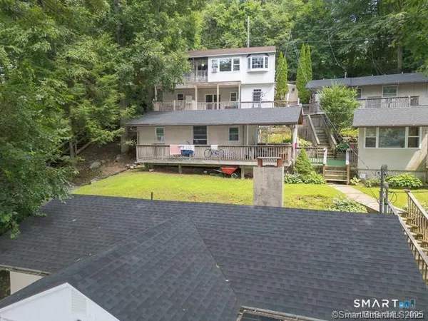 a view of a house with a swimming pool