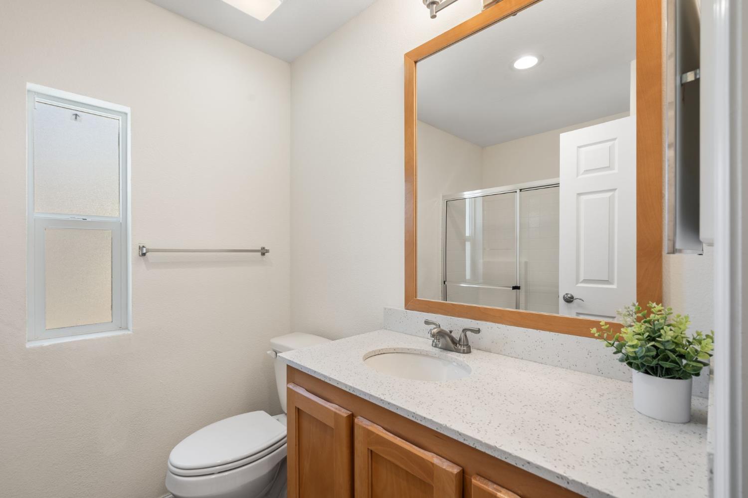 4695 Pacific Street, Unit 9 Rocklin, CA 95667 - Photo 11 of 27 a bathroom with a sink and a mirror