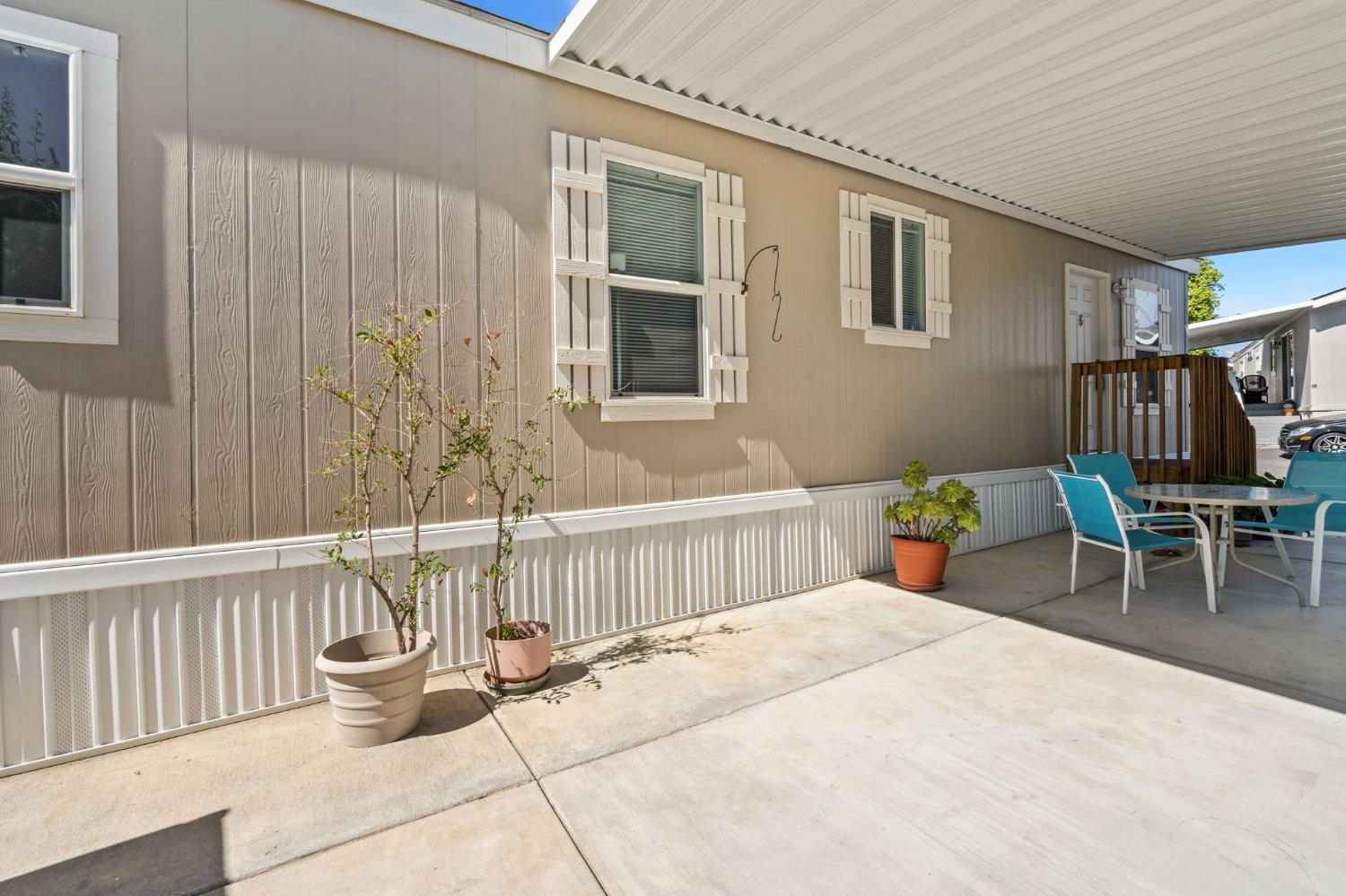 4695 Pacific Street, Unit 9 Rocklin, CA 95667 - Photo 22 of 27 a bedroom with furniture and a window