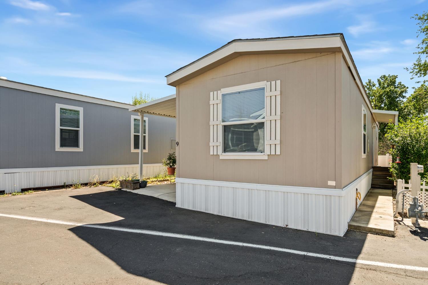 4695 Pacific Street, Unit 9 Rocklin, CA 95667 - Photo 23 of 27 a front view of a house with garage