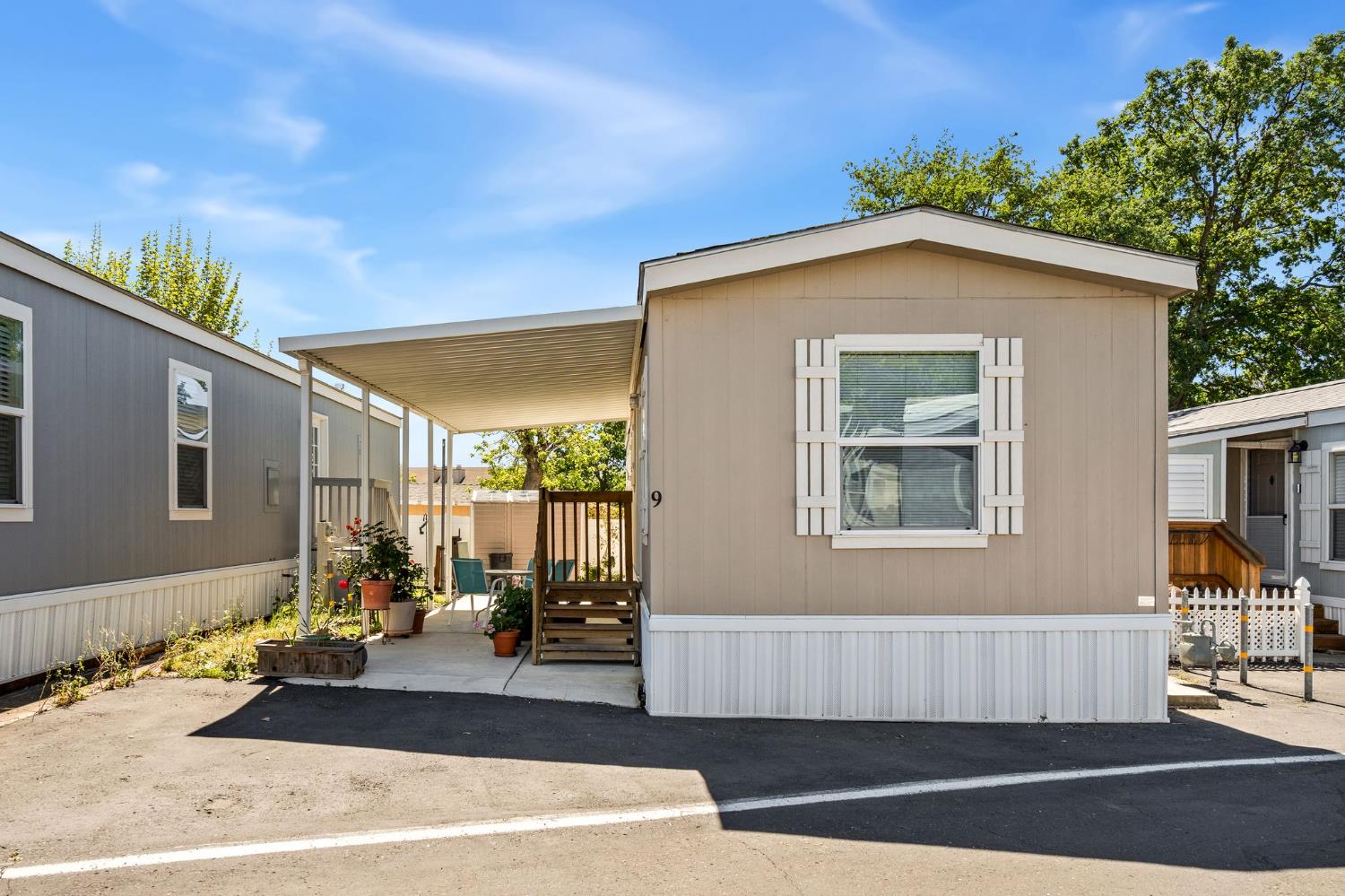 4695 Pacific Street, Unit 9 Rocklin, CA 95667 - Photo 24 of 27 a view of house with yard