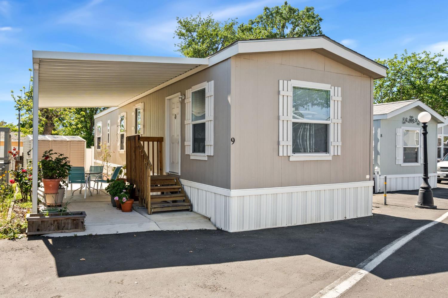 4695 Pacific Street, Unit 9 Rocklin, CA 95667 - Photo 25 of 27 a view of a house with a porch