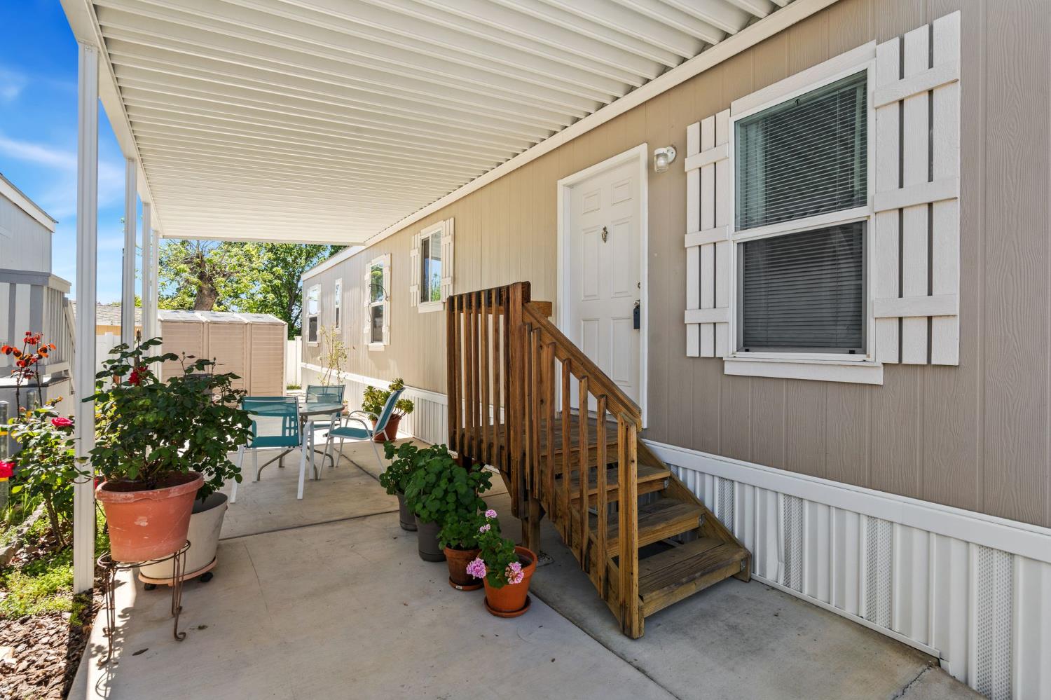 4695 Pacific Street, Unit 9 Rocklin, CA 95667 - Photo 26 of 27 a view of a balcony with chairs potted plants