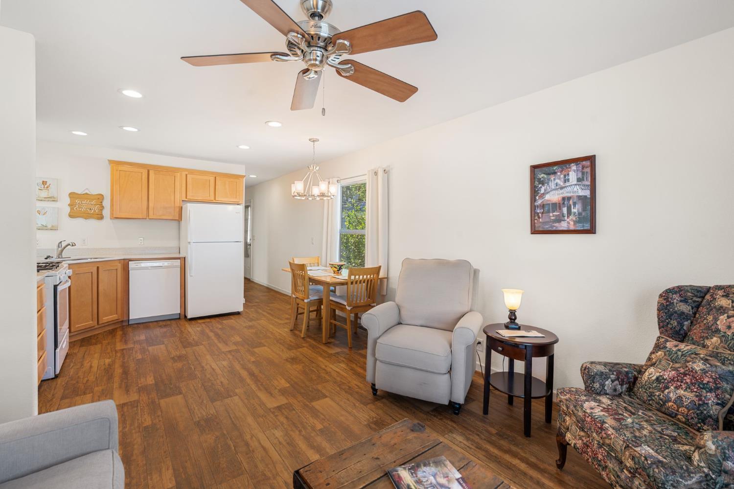 4695 Pacific Street, Unit 9 Rocklin, CA 95667 - Photo 4 of 27 a living room with furniture and kitchen view