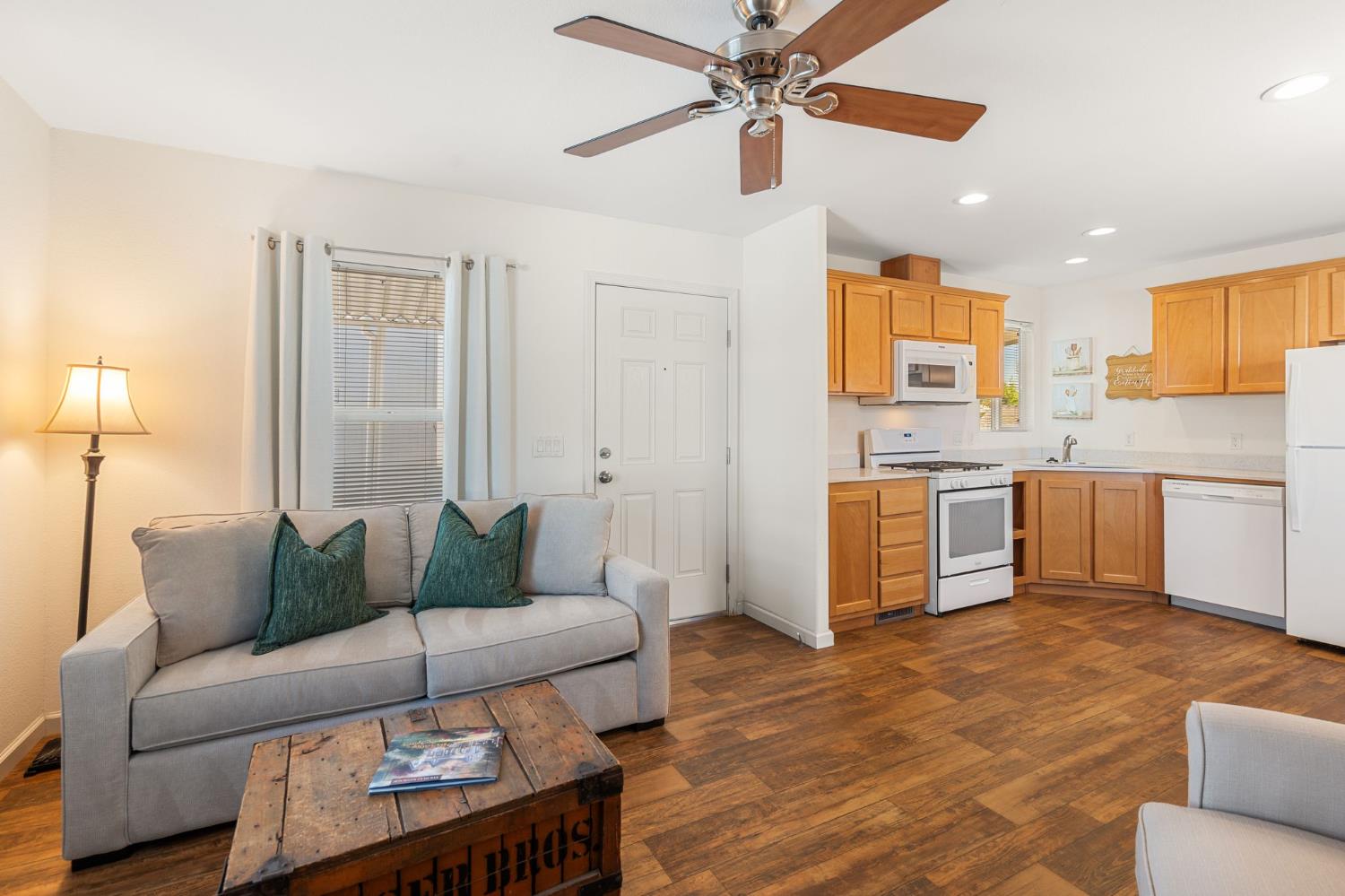 4695 Pacific Street, Unit 9 Rocklin, CA 95667 - Photo 5 of 27 a living room with furniture and kitchen view