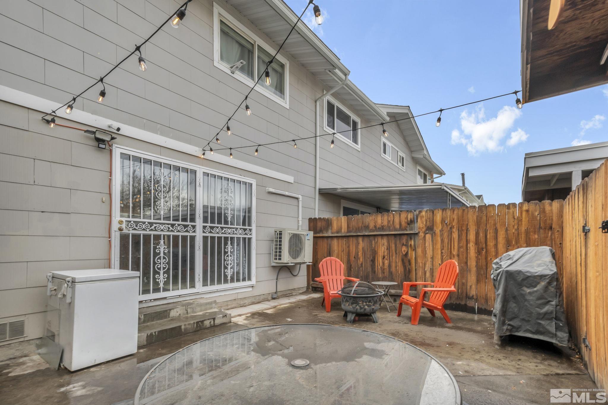 112 Smithridge Reno, NV 89502 - Photo 31 of 37 a view of a patio with a table and chairs