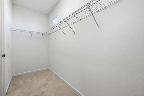 a view of a room with racks on the wall