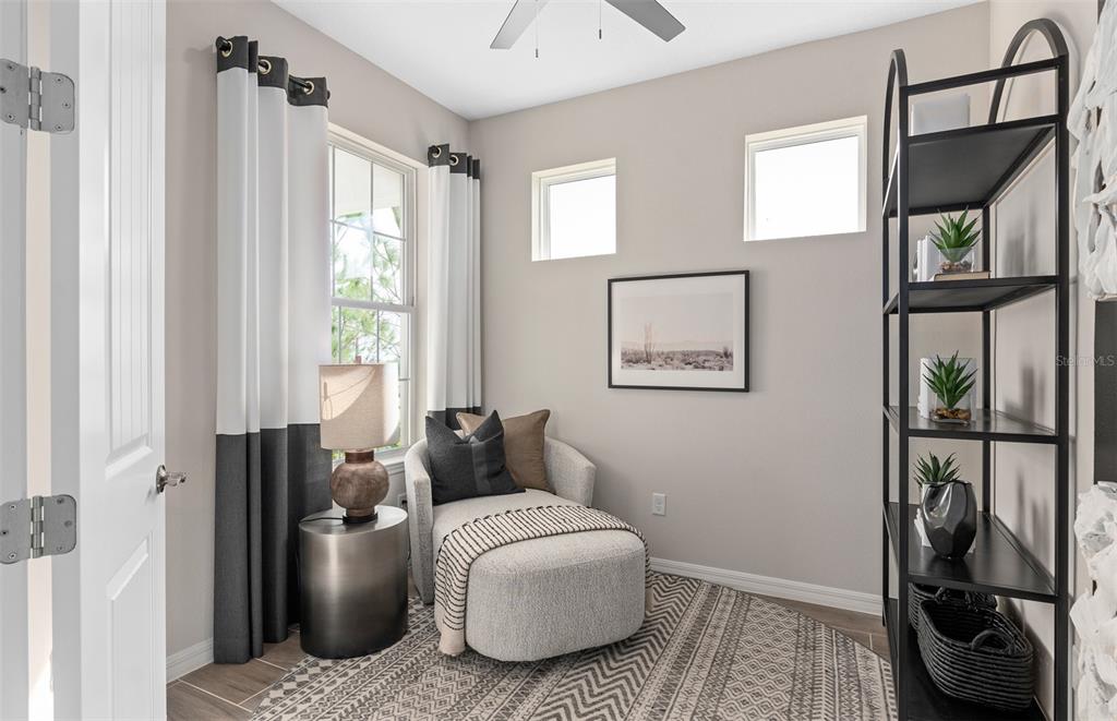 2370 Lily Bloom Road St. Cloud, FL 34771 - Photo 17 of 22 a living room with furniture and a window