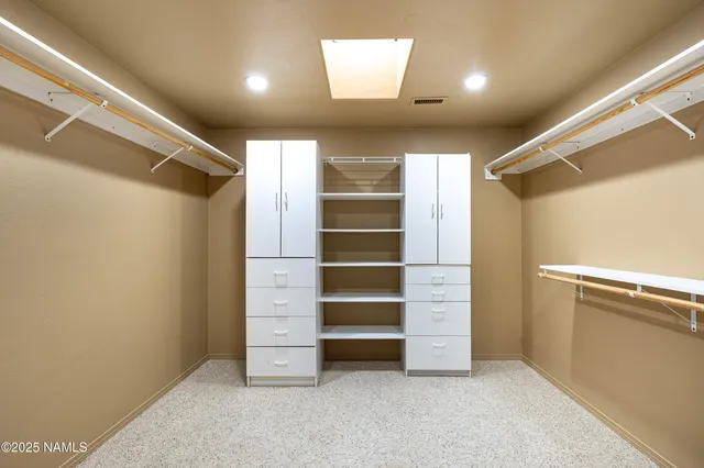 a utility room with sink dryer and washer
