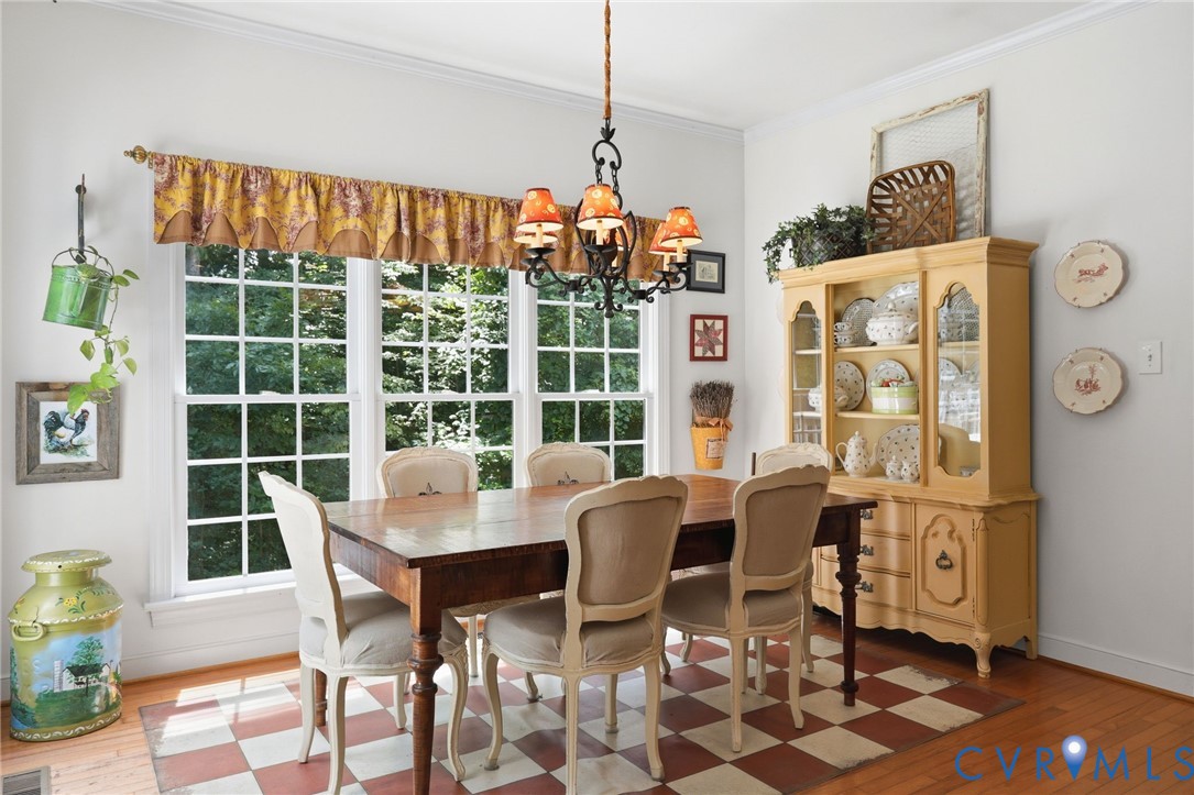 13424 Tipple Point Road Midlothian, VA 23114 - Photo 15 of 53 a view of a dining room with furniture window and outside view