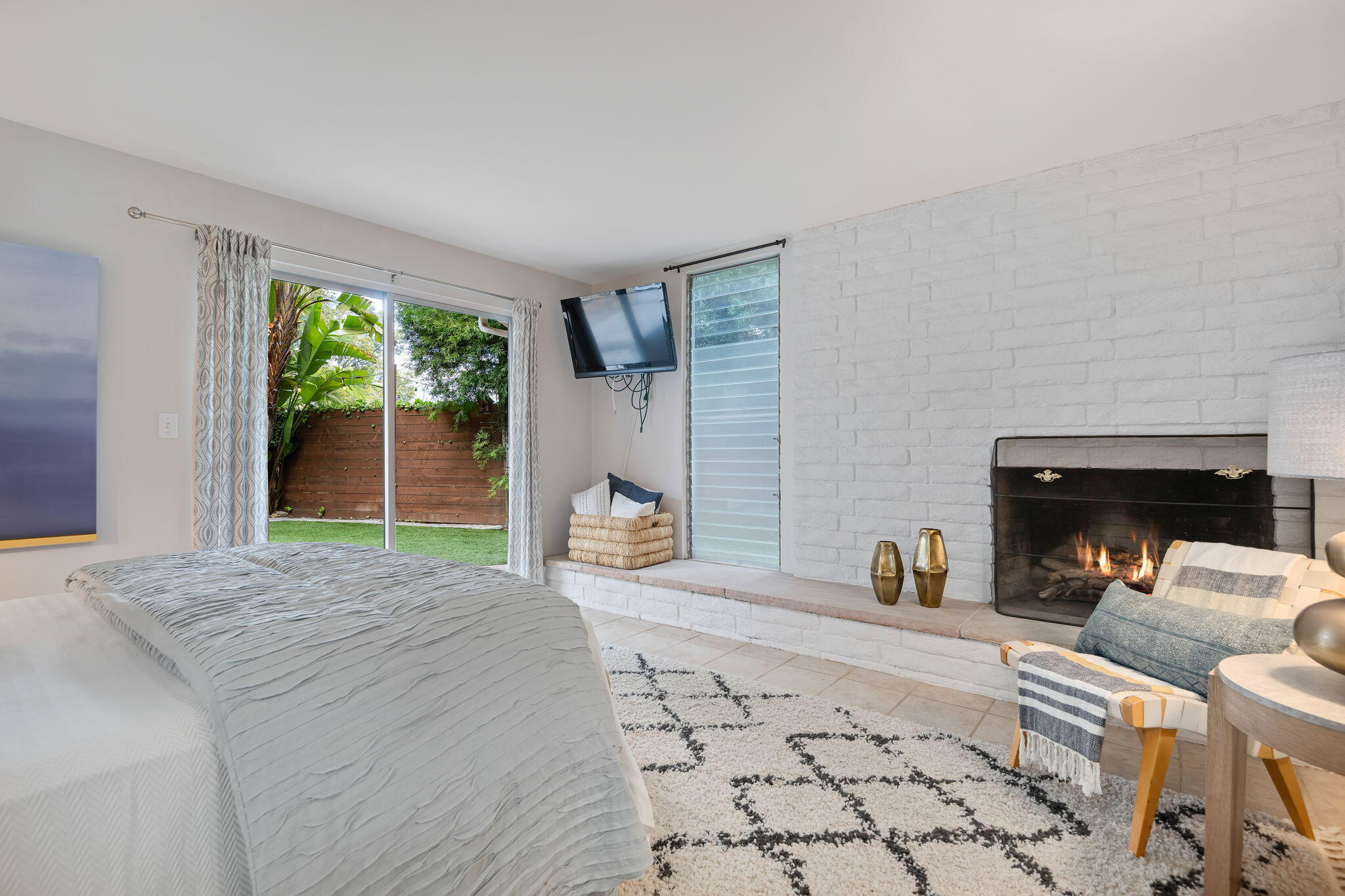 5 Fellowship Circle Santa Barbara, CA 93109 - Photo 17 of 32 a view of a livingroom with a fireplace and a large window