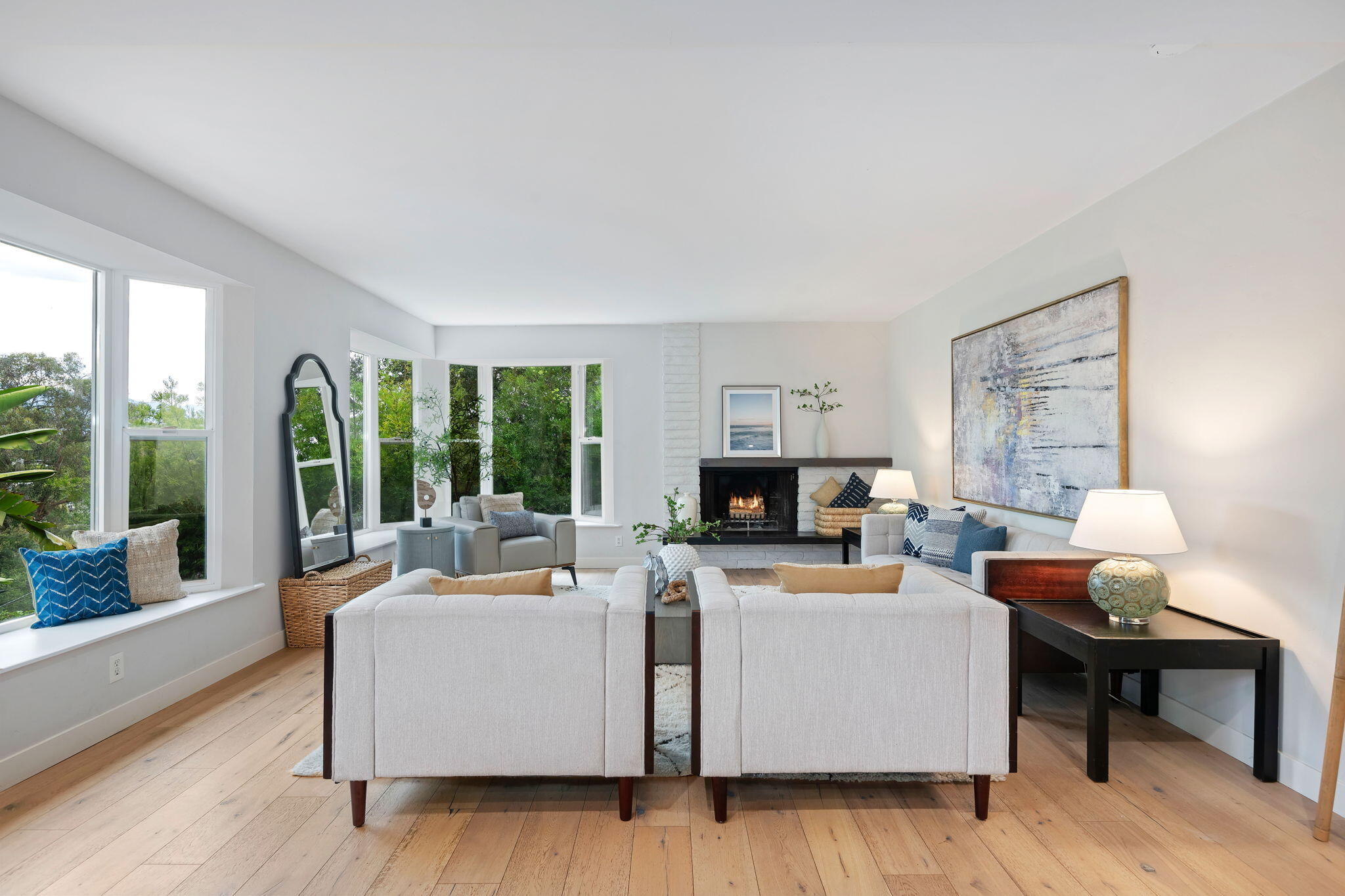 5 Fellowship Circle Santa Barbara, CA 93109 - Photo 2 of 32 a living room with furniture and a fireplace