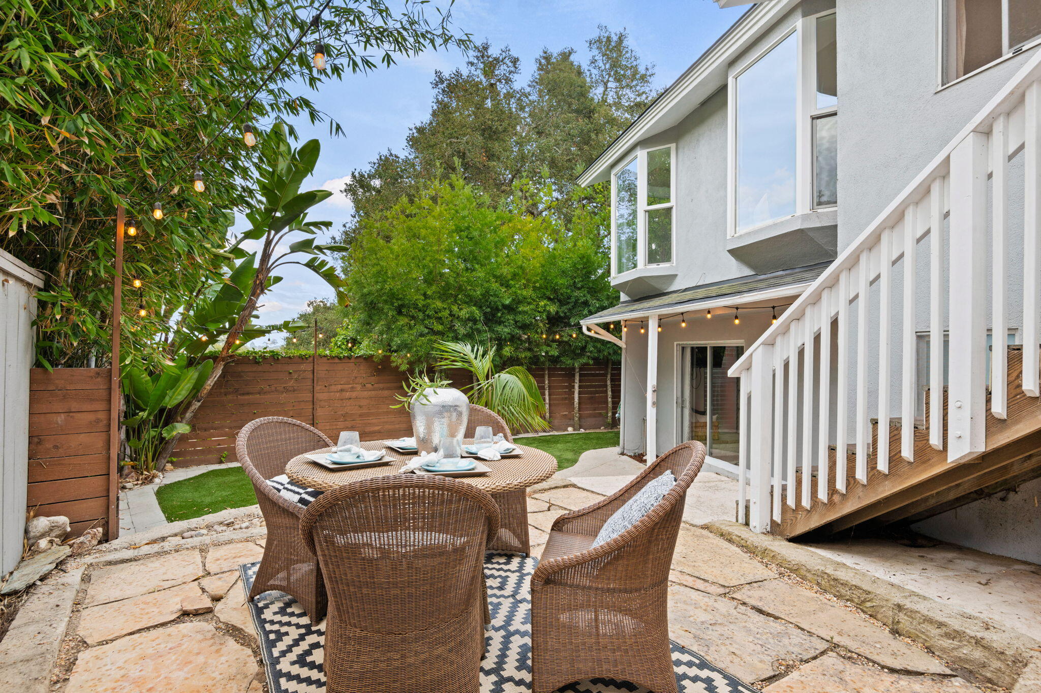 5 Fellowship Circle Santa Barbara, CA 93109 - Photo 24 of 32 a view of a patio with a table and chairs