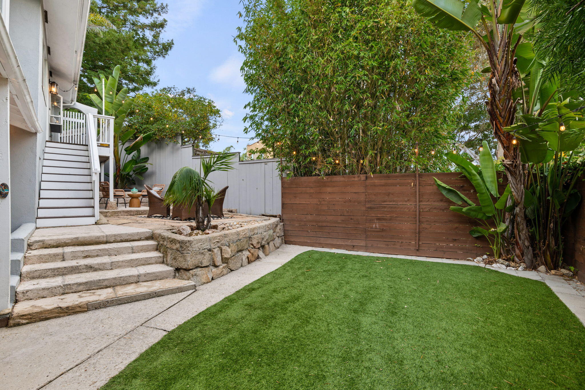 5 Fellowship Circle Santa Barbara, CA 93109 - Photo 25 of 32 a view of a garden with a bench