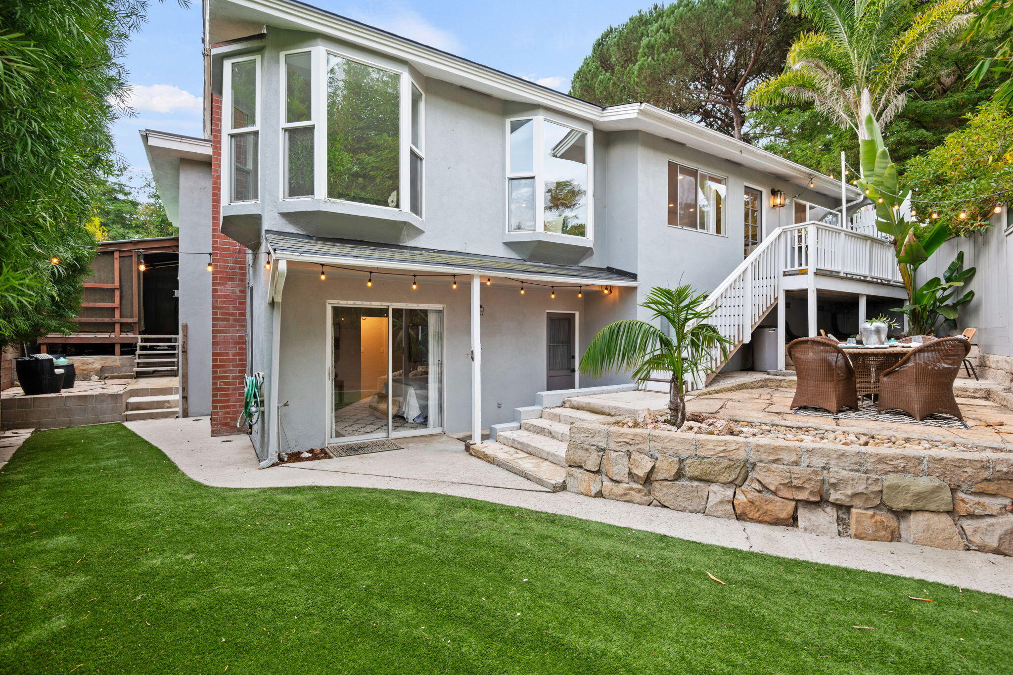 5 Fellowship Circle Santa Barbara, CA 93109 - Photo 26 of 32 a front view of a house with a yard