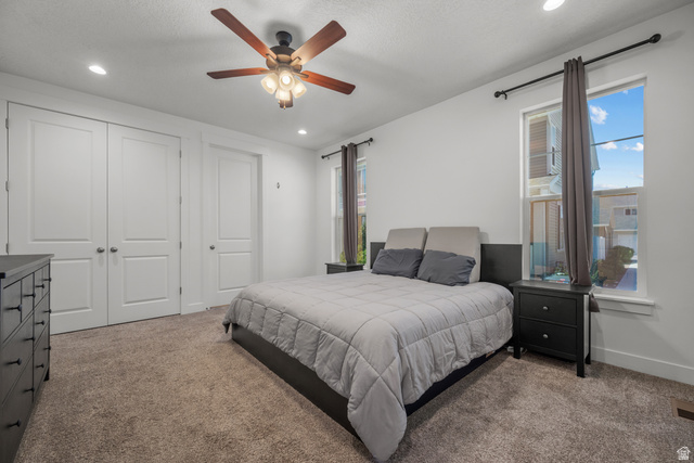 1693 North Center Point Lane Salem, UT 84653 - Photo 11 of 26 Carpeted room featuring a ceiling fan with integrated lighting, recessed lighting, and two windows with white trim