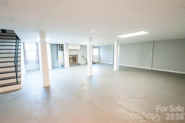 a white toilet sitting next to a bathroom sink