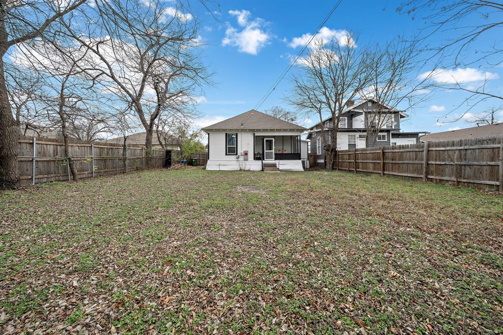1916 Mitchell Avenue Waco, TX 76708 - Photo 14 of 32 a view of a house with a yard